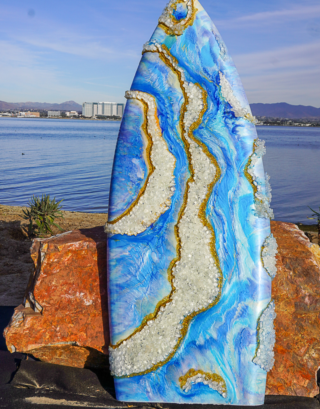 Epoxy resin surfboard with geodes