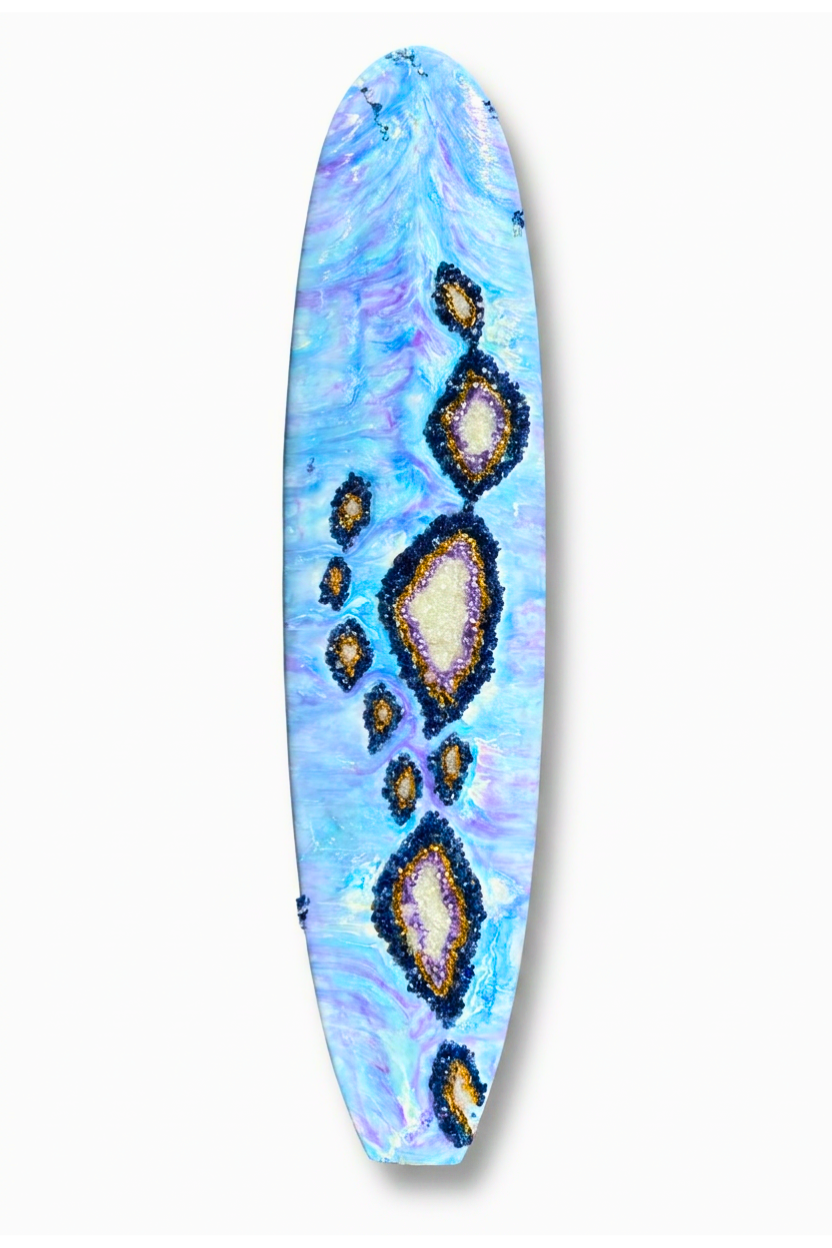 epoxy resin surfboard with crystal quartz and geode