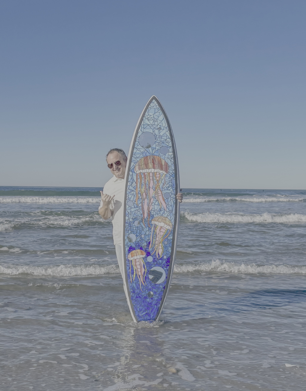 stain glass surfboard art with 3 jellyfish